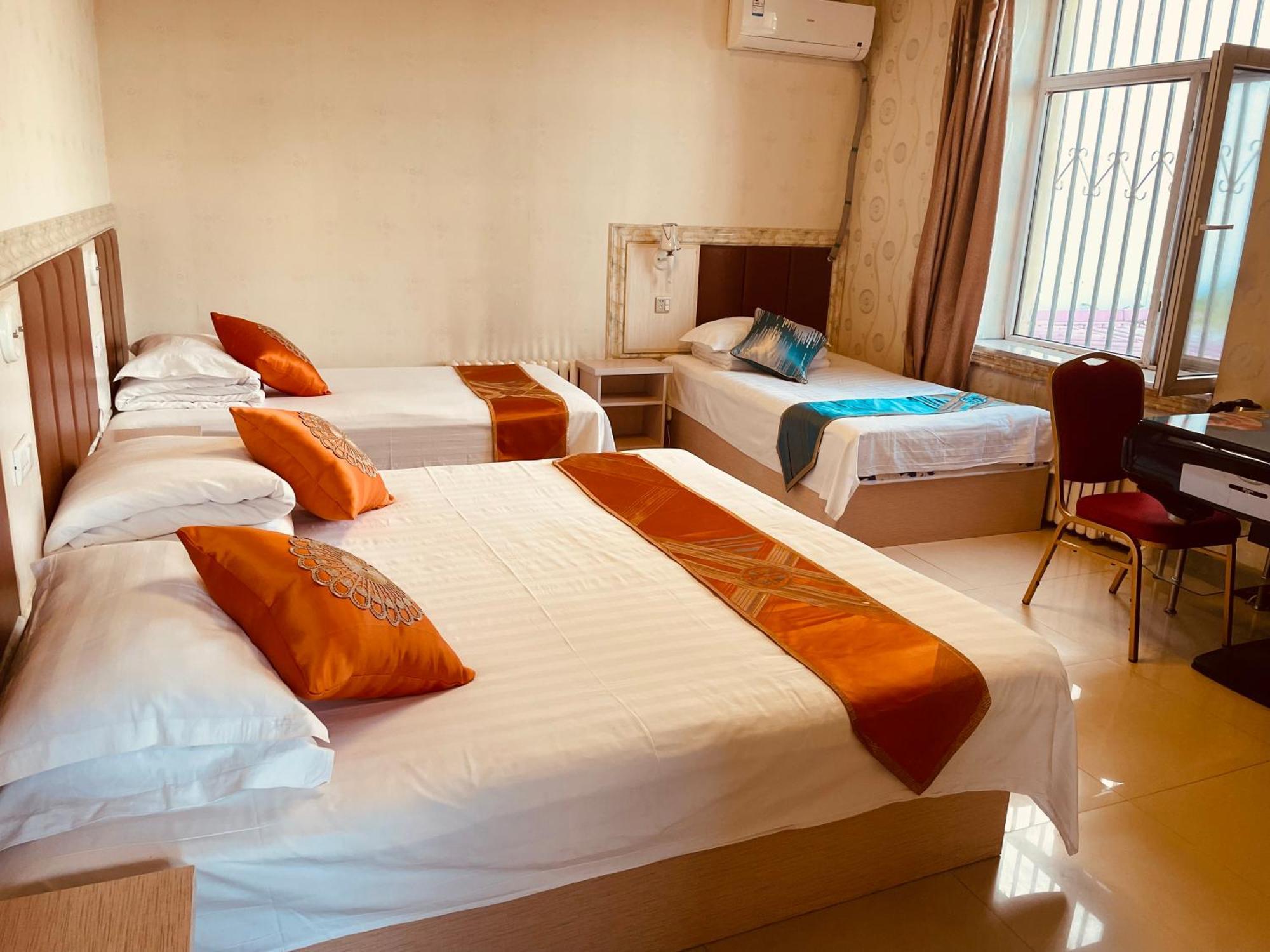 哈尔滨机场东方红运宾馆 Hotel Værelse billede