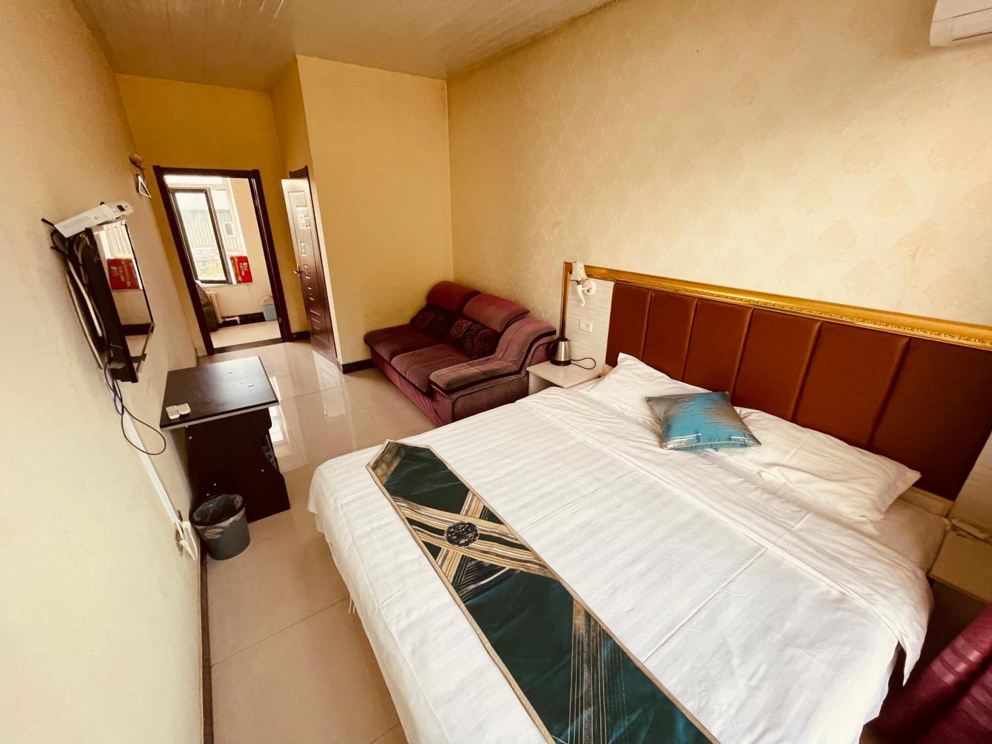 哈尔滨机场东方红运宾馆 Hotel Værelse billede