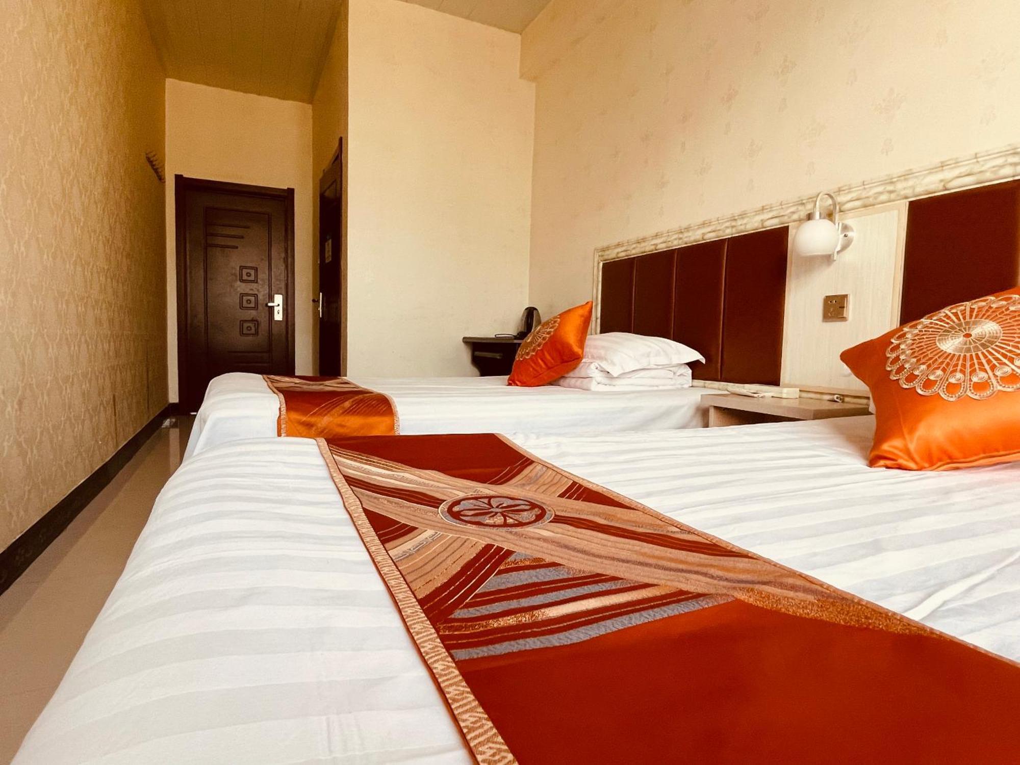 哈尔滨机场东方红运宾馆 Hotel Værelse billede