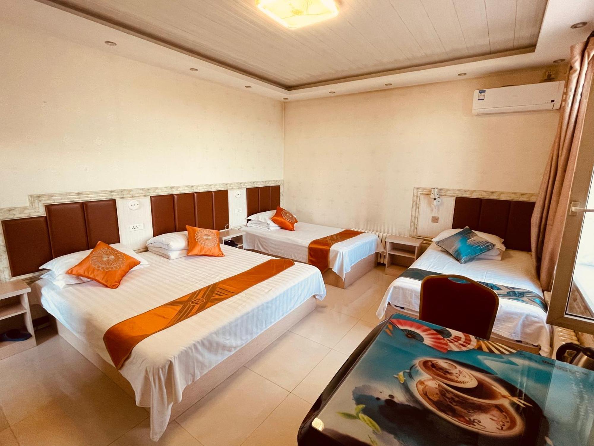 哈尔滨机场东方红运宾馆 Hotel Værelse billede
