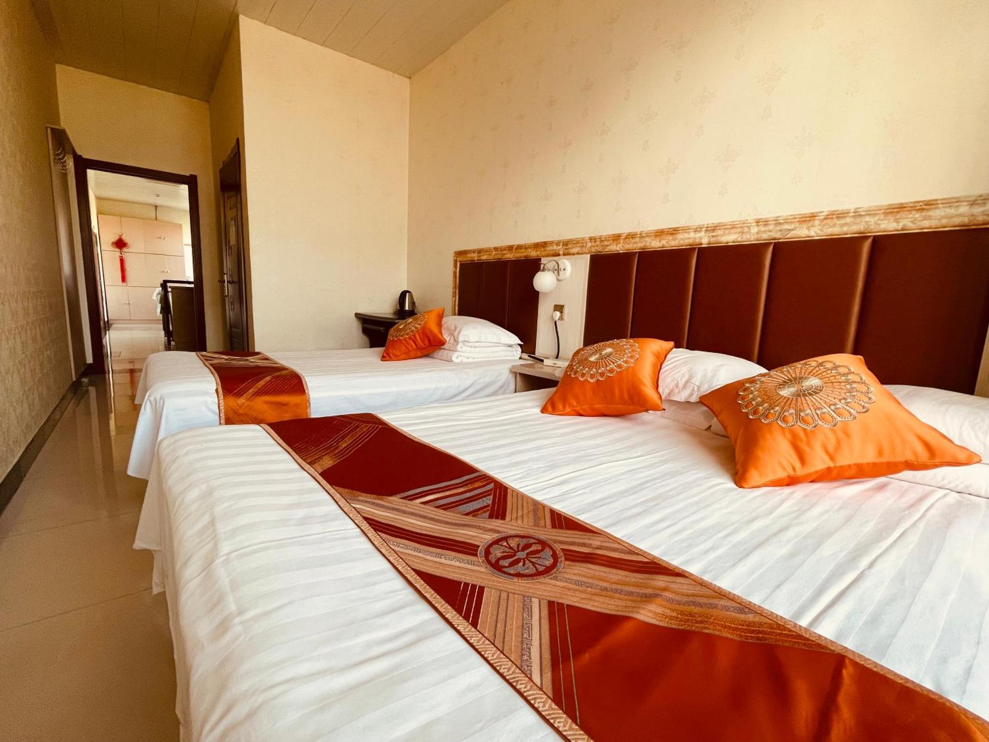 哈尔滨机场东方红运宾馆 Hotel Værelse billede