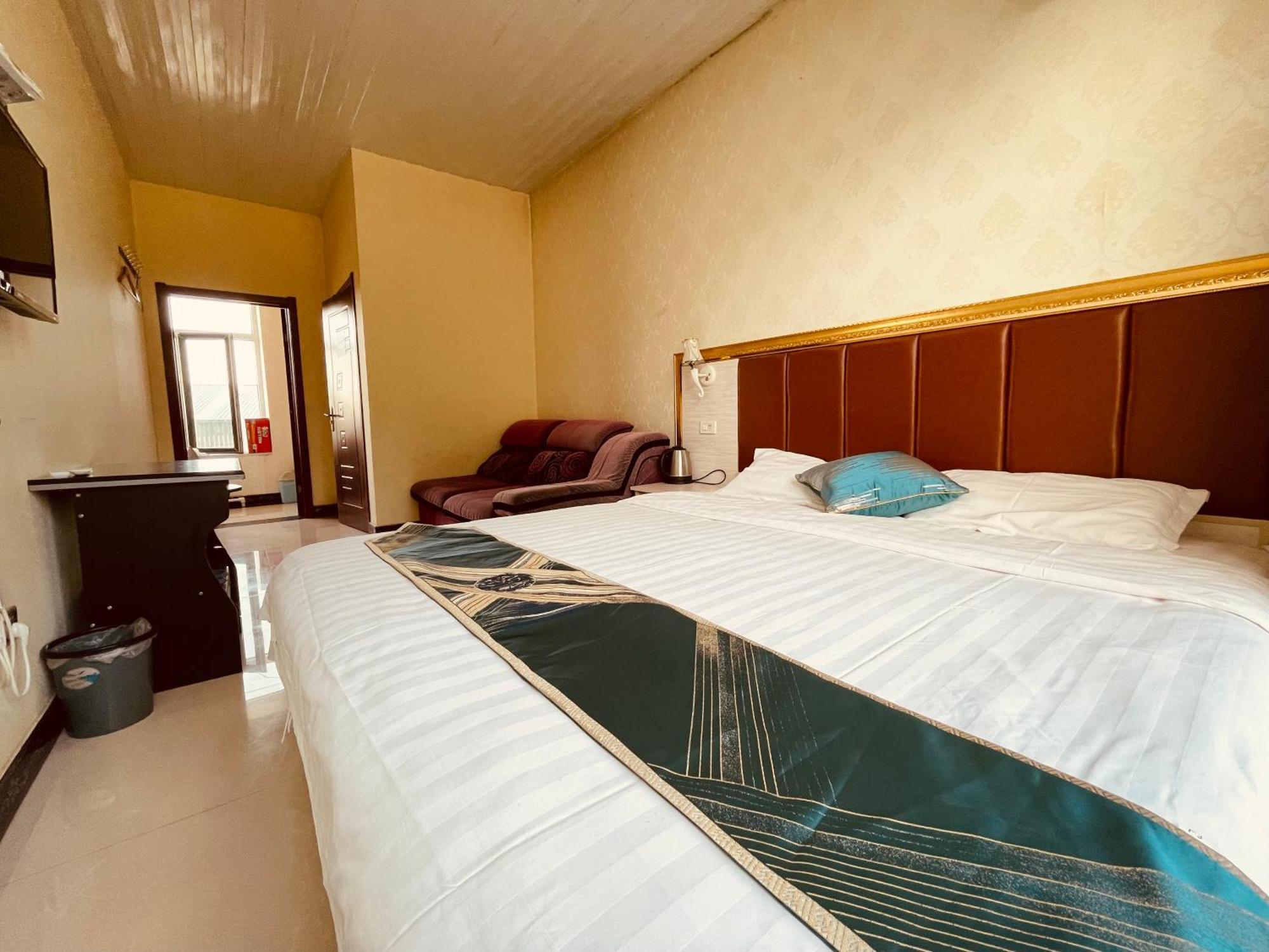 哈尔滨机场东方红运宾馆 Hotel Værelse billede