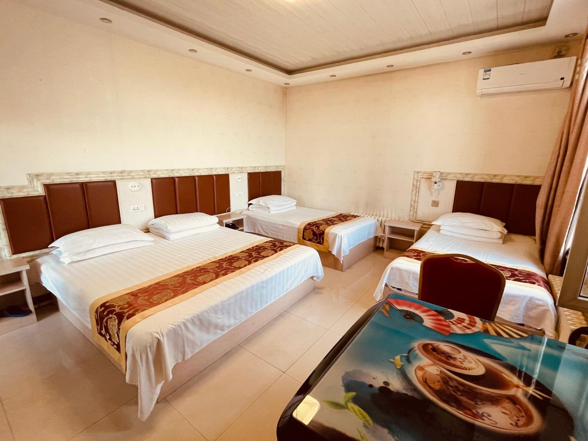 哈尔滨机场东方红运宾馆 Hotel Værelse billede