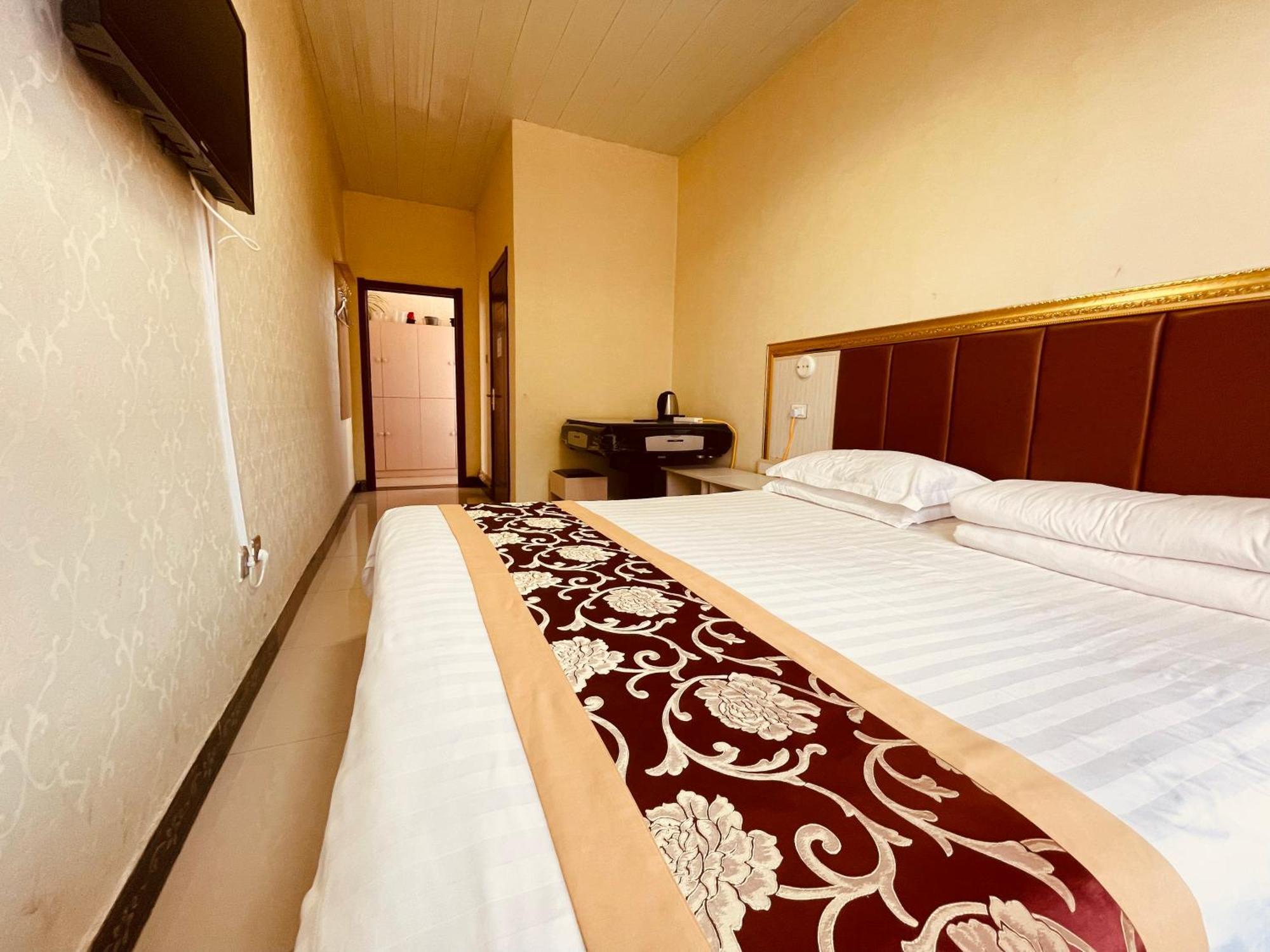 哈尔滨机场东方红运宾馆 Hotel Værelse billede