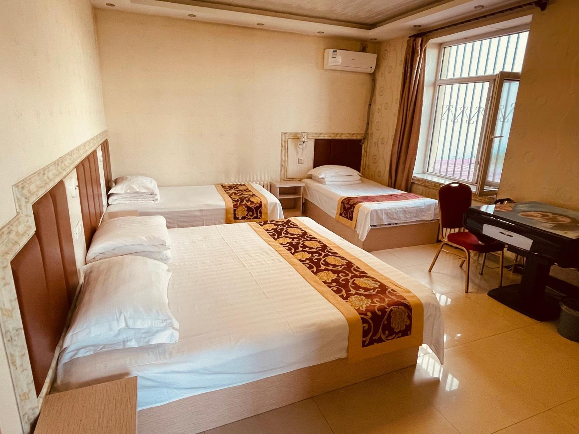哈尔滨机场东方红运宾馆 Hotel Værelse billede